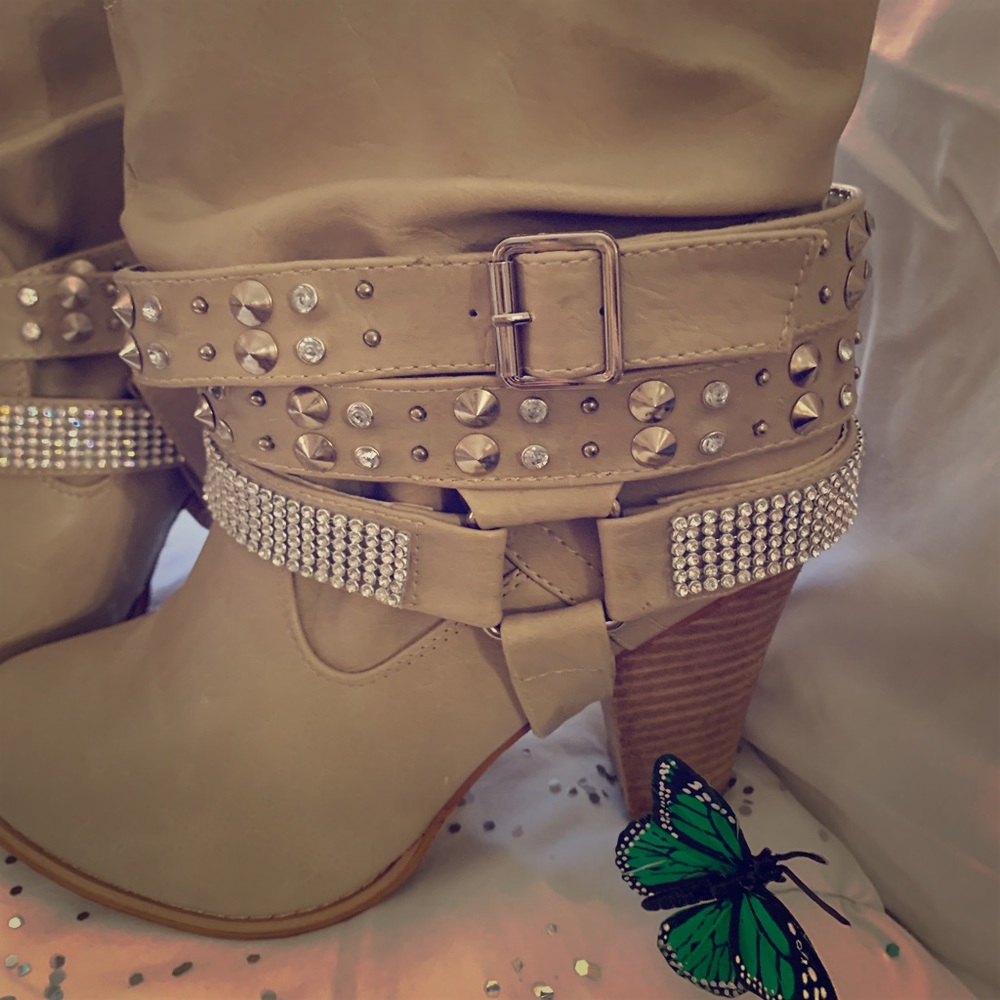High heeled, tan, jeweled boots. Must have!!
